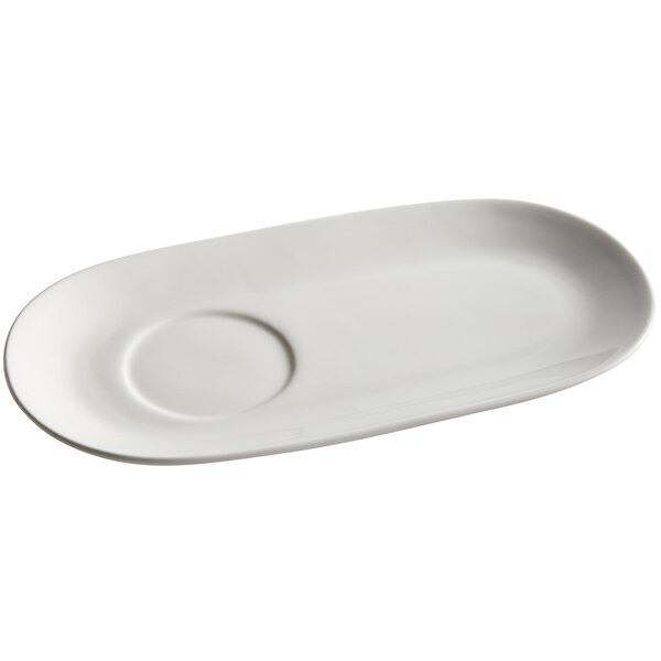 A Tuxton AlumaTux Pearl White oval china platter with a circle in the middle.