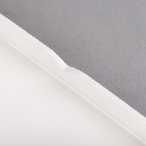 A white box with "Arcoroc" in white text on a white background.