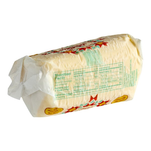 A 2-pound roll of Minerva Dairy small batch Amish sea salted butter wrapped in paper packaging.