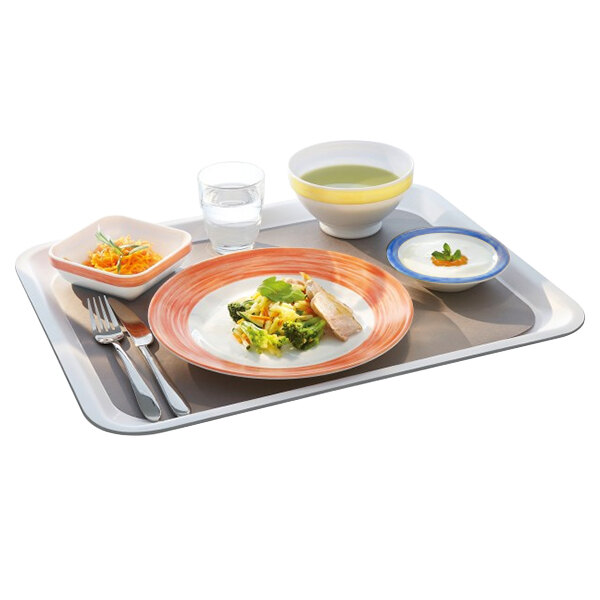 A bowl of food with a fork on a table