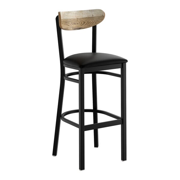 A black bar stool with a black vinyl seat and a driftwood-finished wooden backrest.