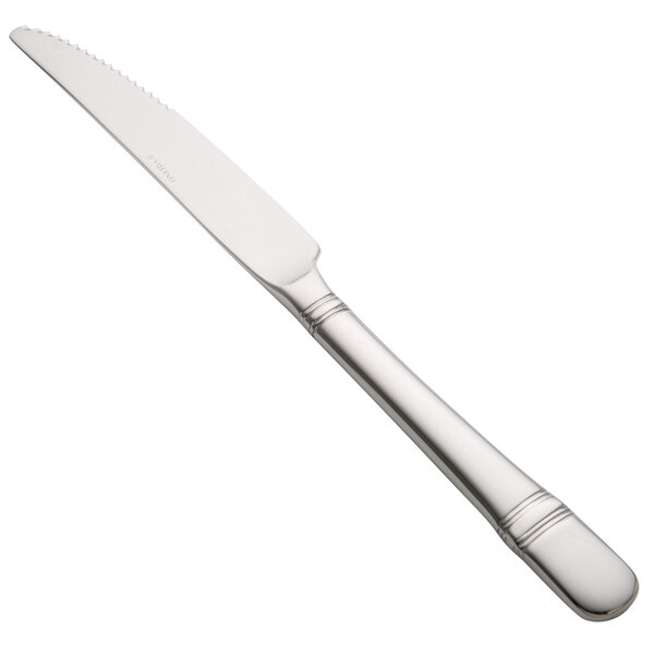 A Oneida Astragal stainless steel steak knife with a handle.