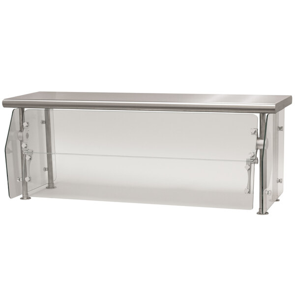 A stainless steel food shield with clear glass.
