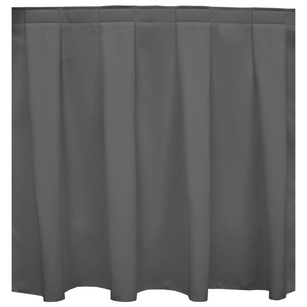 A grey box pleat table skirt with velcro clips.