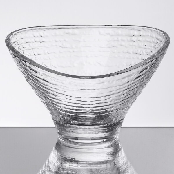 An Arcoroc clear glass bowl with ripples.