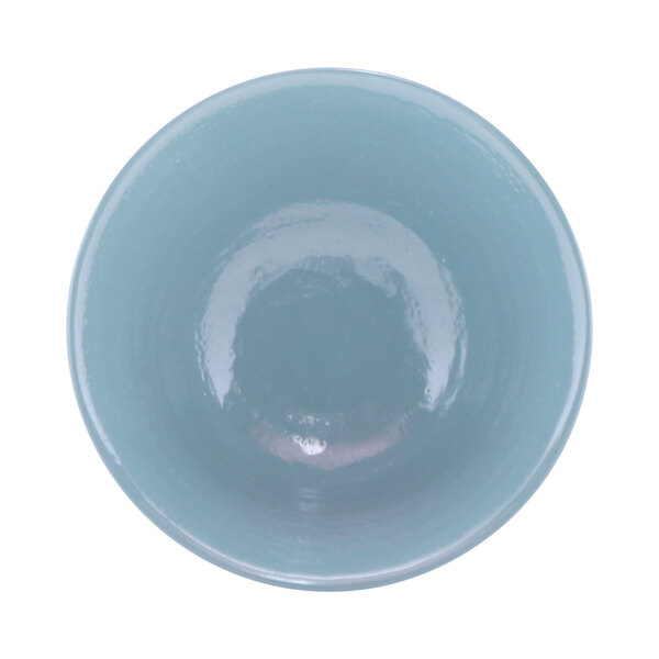 A white bowl with a blue rim.