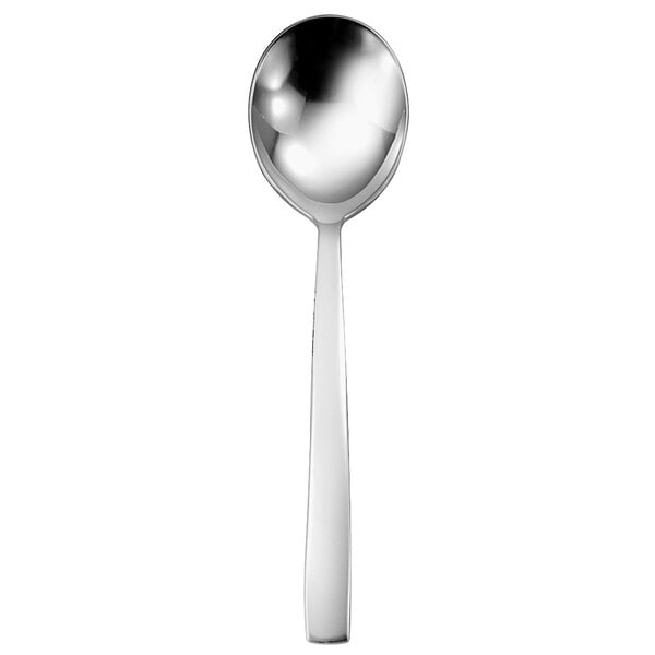 A silver spoon with a long handle.