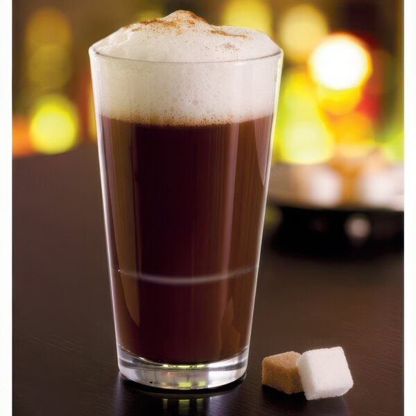 A customizable highball glass filled with a liquid next to sugar cubes.