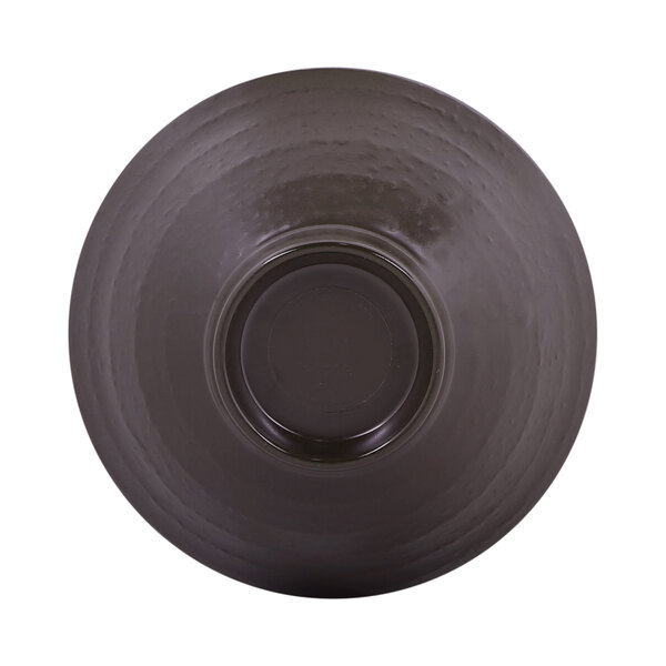 A black melamine bowl with a brown rim and a circular center.