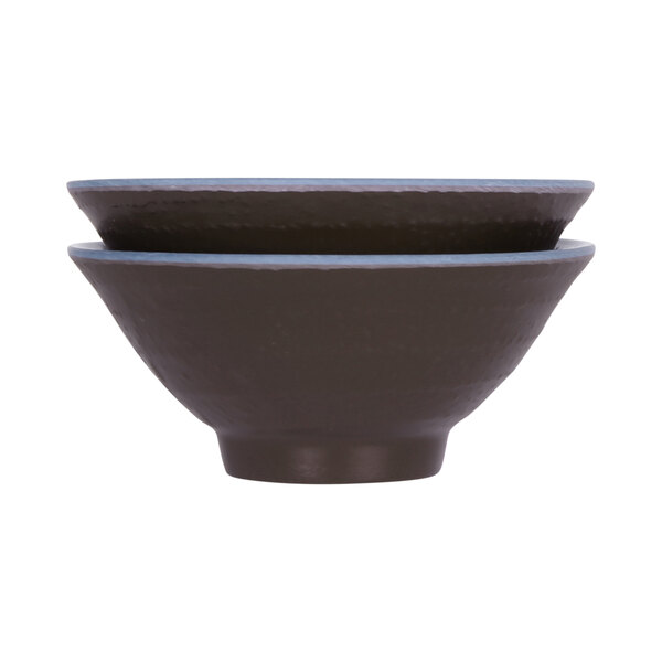 A close-up of a black and blue melamine bowl.