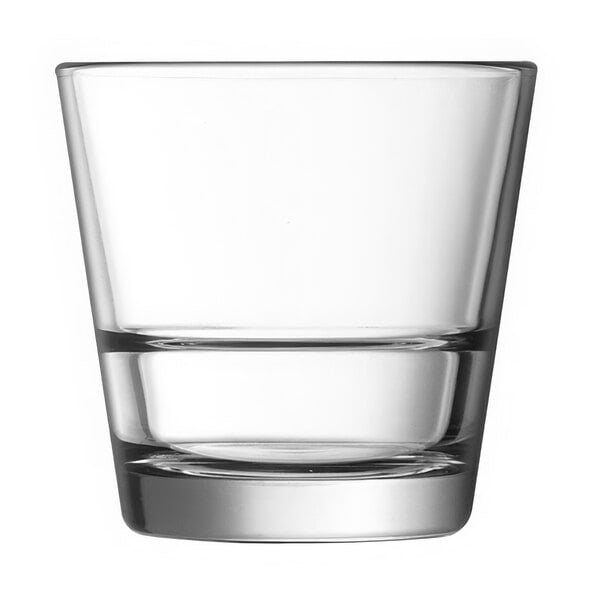 An Arcoroc customizable rocks glass filled with a clear liquid.