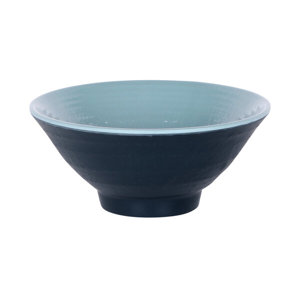 Abyss and lapis blue melamine bowl with a white background and rim.