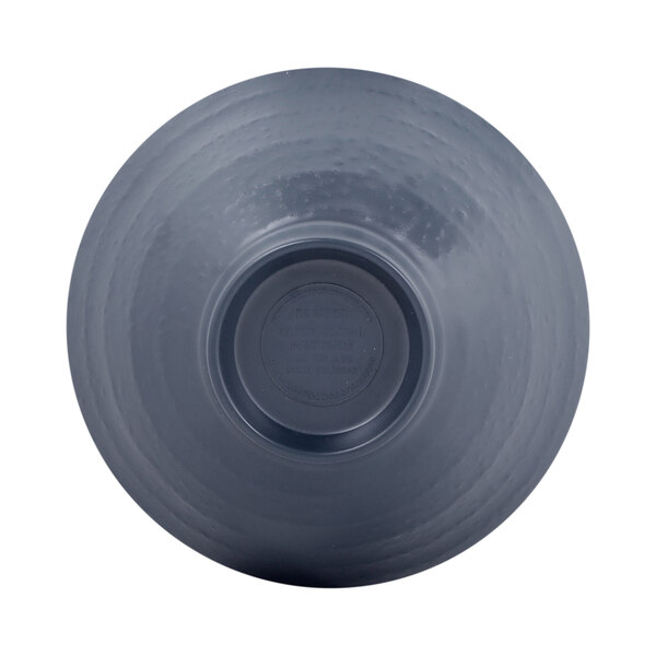 Abyss and lapis blue bowl with a black circular surface.