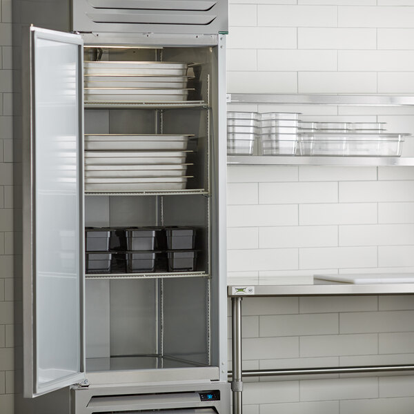 A Beverage-Air reach-in refrigerator with a door open.