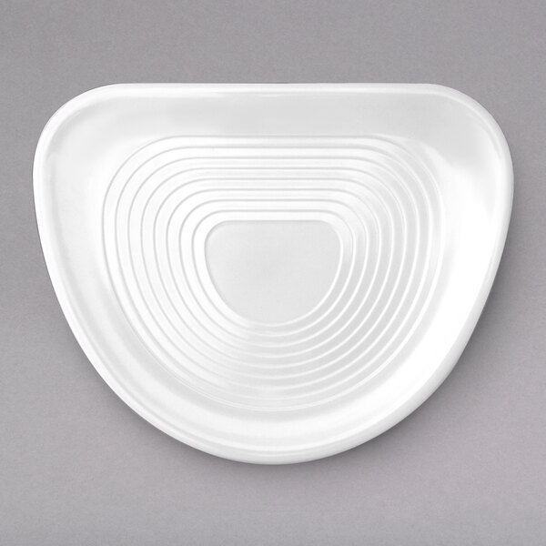 A white triangular melamine plate with a curved design on the edge.