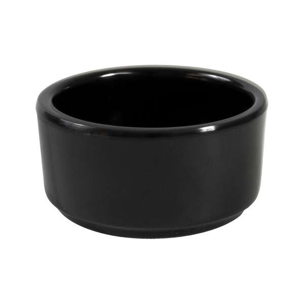 A black round melamine ramekin on a white background.