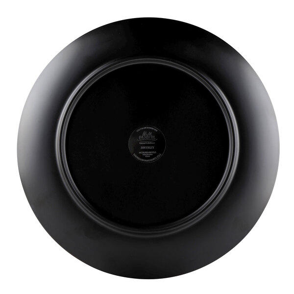 A black Elite Global Solutions melamine plate with a round red center and a red circle around the edge.