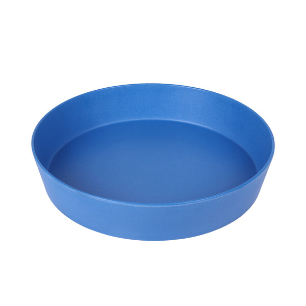 A blue round pan with a round center.