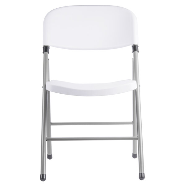 white folding table and chairs