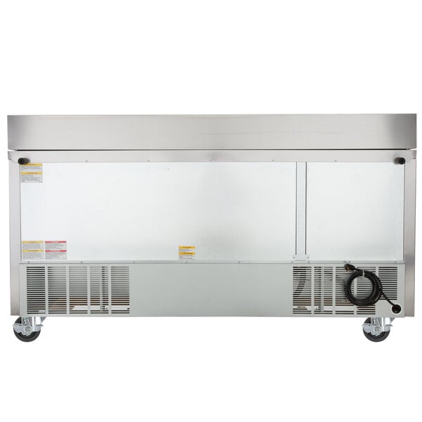 A stainless steel Beverage-Air sandwich prep table on a white counter.