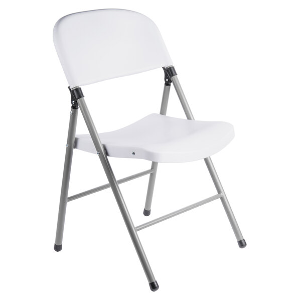 white folding table and chairs