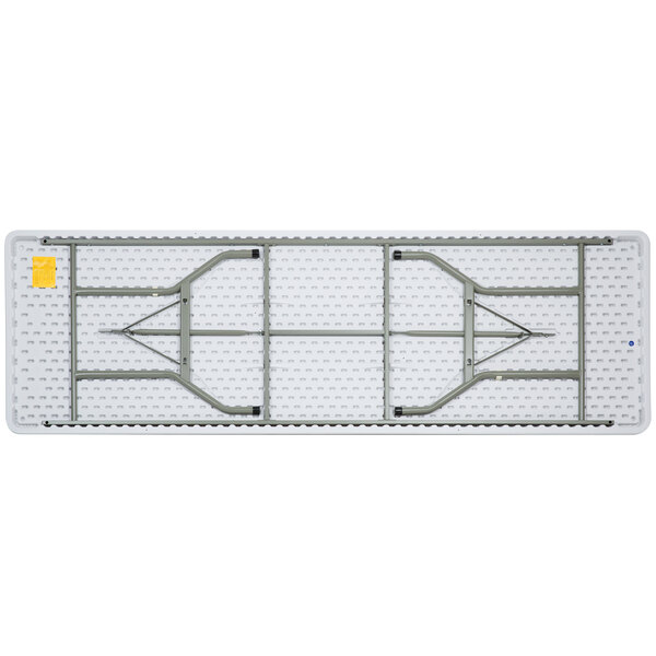A Lancaster Table & Seating white rectangular plastic folding table with metal bars.