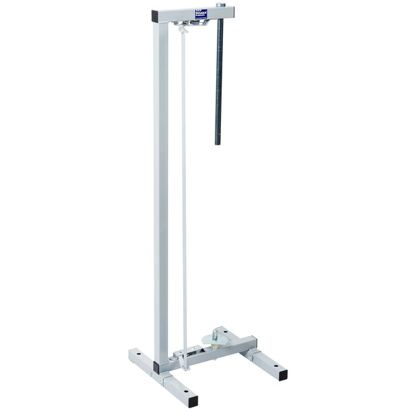 A white metal Bulman vertical paper rack with a long handle.