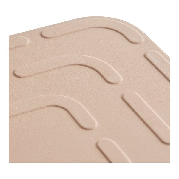 An American Metalcraft rectangular ceramic pizza stone with a beige pattern on it.