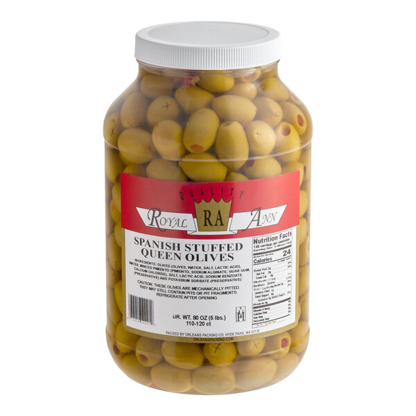 A large plastic jar of Royal Ann Spanish stuffed queen olives with a red and white label.