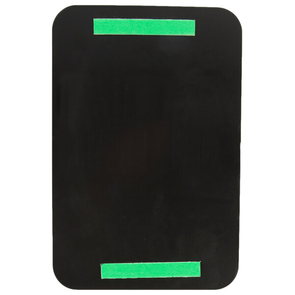 A black rectangular Tablecraft ADA restroom sign with green and white text and tape.