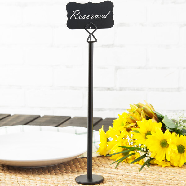 A Tablecraft marquee chalkboard label on a table.