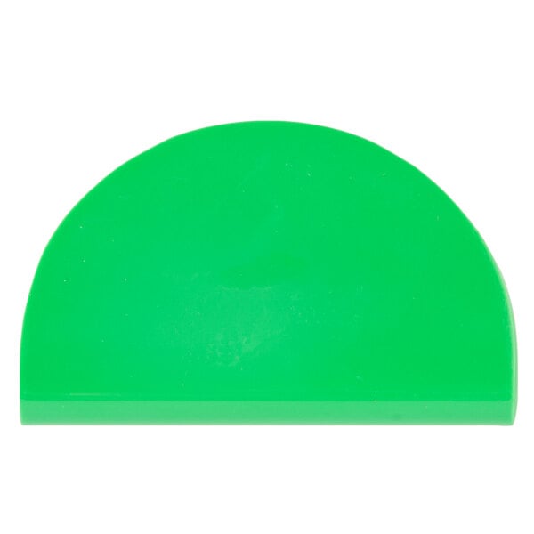 A green plastic object with a white background.