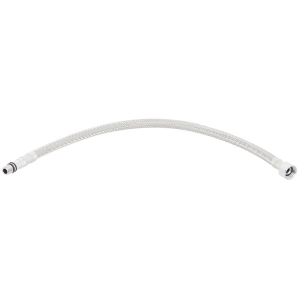 A close-up of a white flexible hose with white and black connectors.