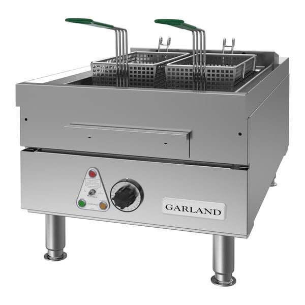 A stainless steel countertop electric deep fryer with two fryer baskets and control knob, designed for commercial use.
