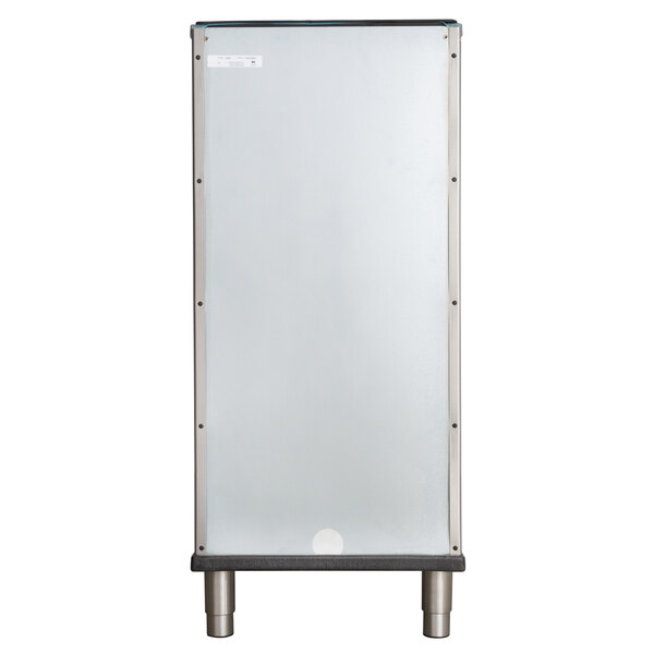 A white rectangular Manitowoc ice storage bin with metal legs.