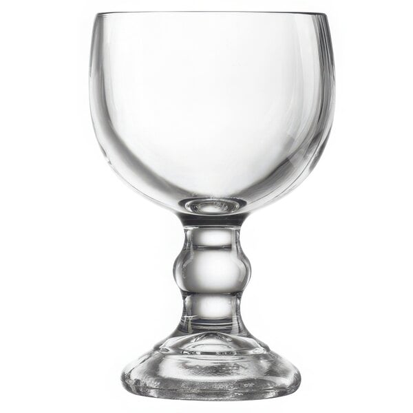 An Arcoroc Schooner glass with a leg on a white background.