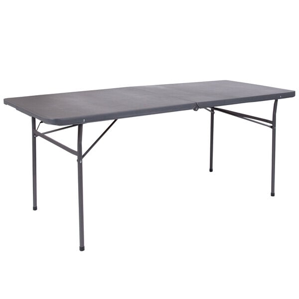 A Flash Furniture rectangular dark gray plastic folding table with metal legs.