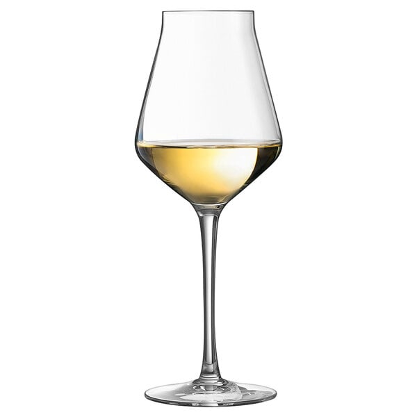 A Chef & Sommelier white wine glass filled with white wine.
