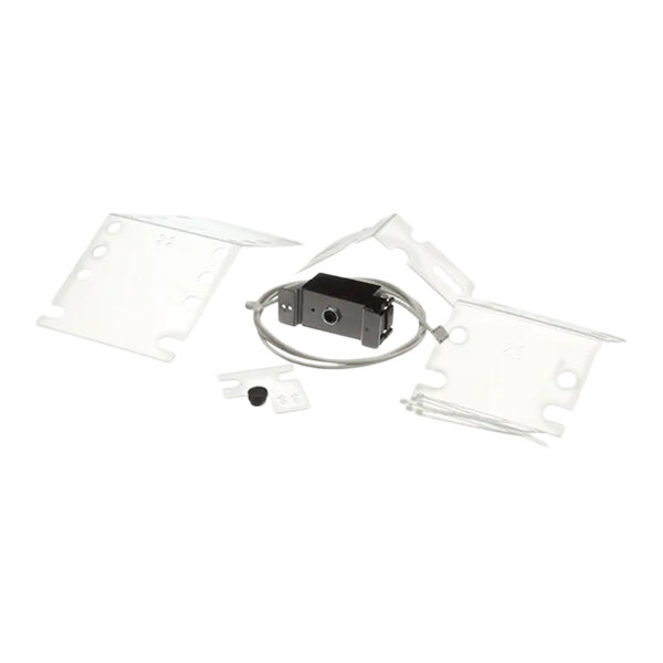 A white plastic kit with black rectangular and small plastic pieces and a screw.