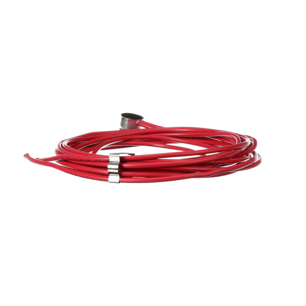 A red cable with a silver connector attached to a Hussmann disc type thermostat.
