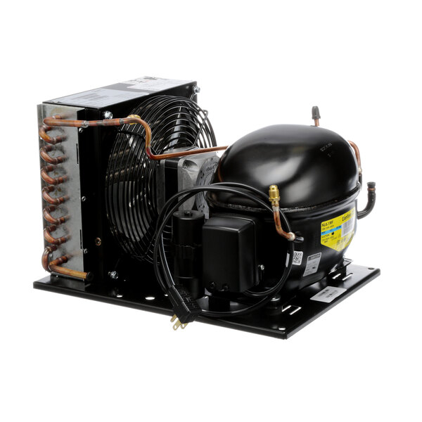 A Stoelting by Vollrath condensing unit for a commercial ice cream freezer with a fan.