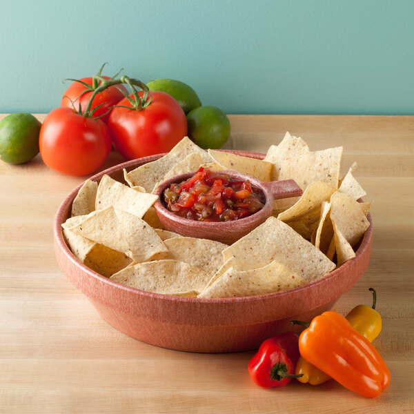 a group of tomatoes on a table