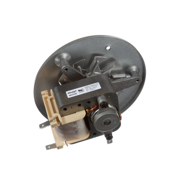 A small metal motor with a round disc.