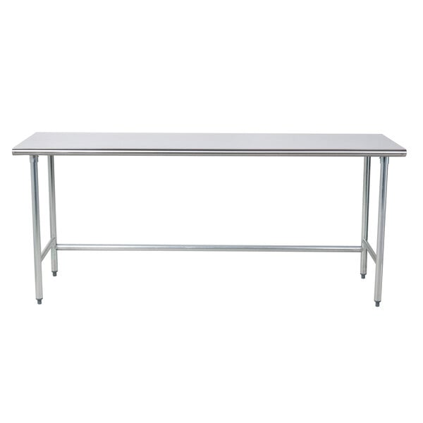A long stainless steel table with metal legs.