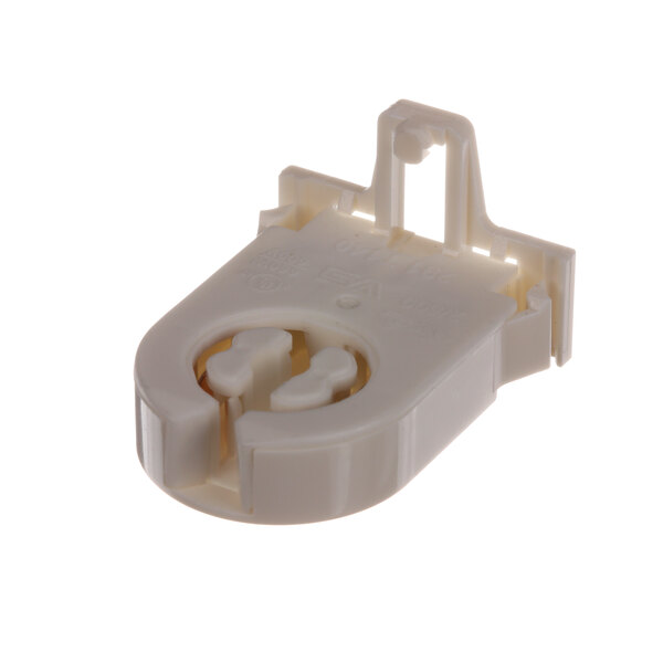 A white plastic Hussmann socket with two holes.