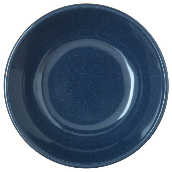 a blue speckled surface with a circular ring