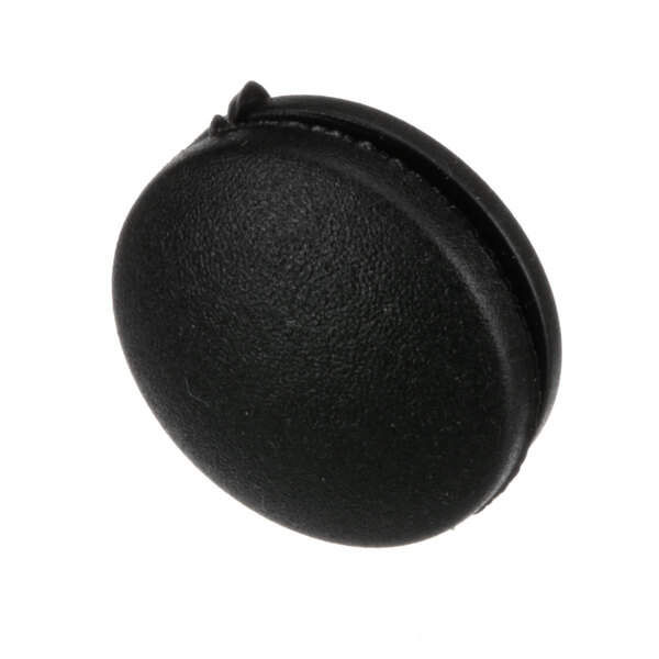 A black round lock button with a hole in the middle.