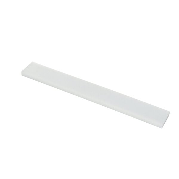 A white rectangular plastic strip.