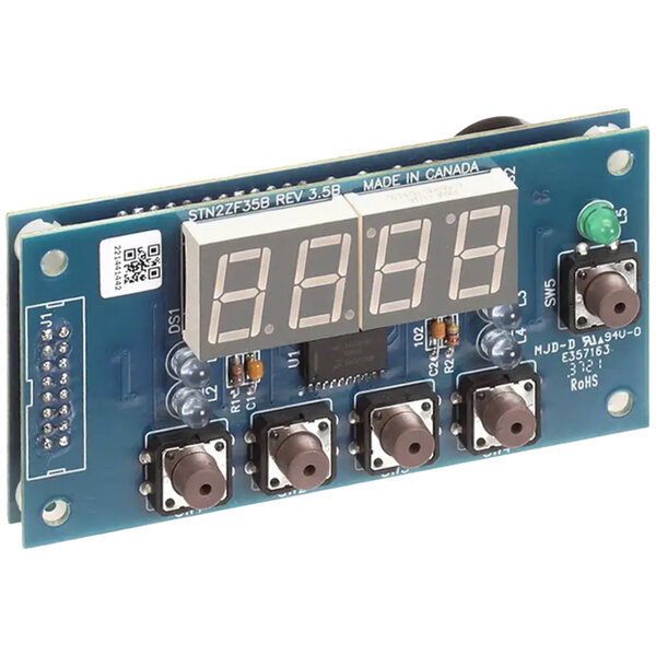 The circuit board of a blue Proluxe LED controller with a digital display.