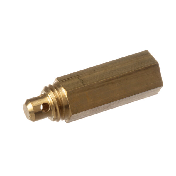 A brass Columna Descar. Gr nozzle with a small hole.